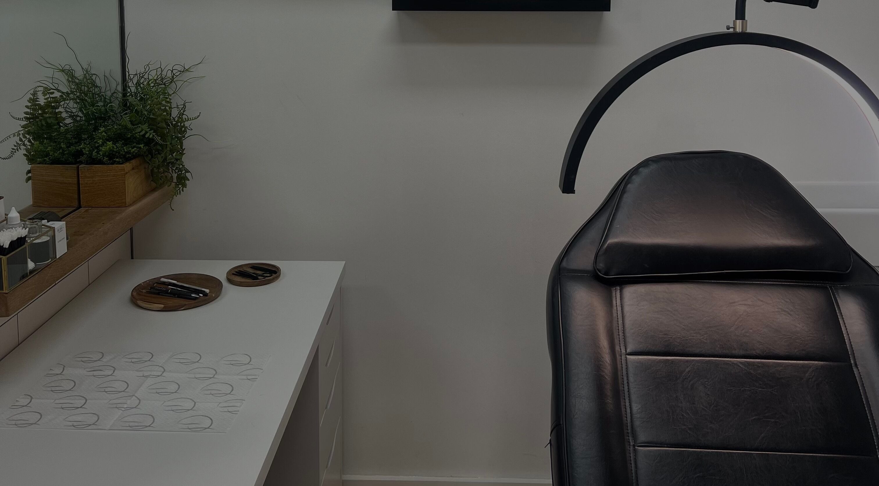 Luxurious treatment room at Arch Envy, Daventry, England, GB with sleek design and modern furnishings.