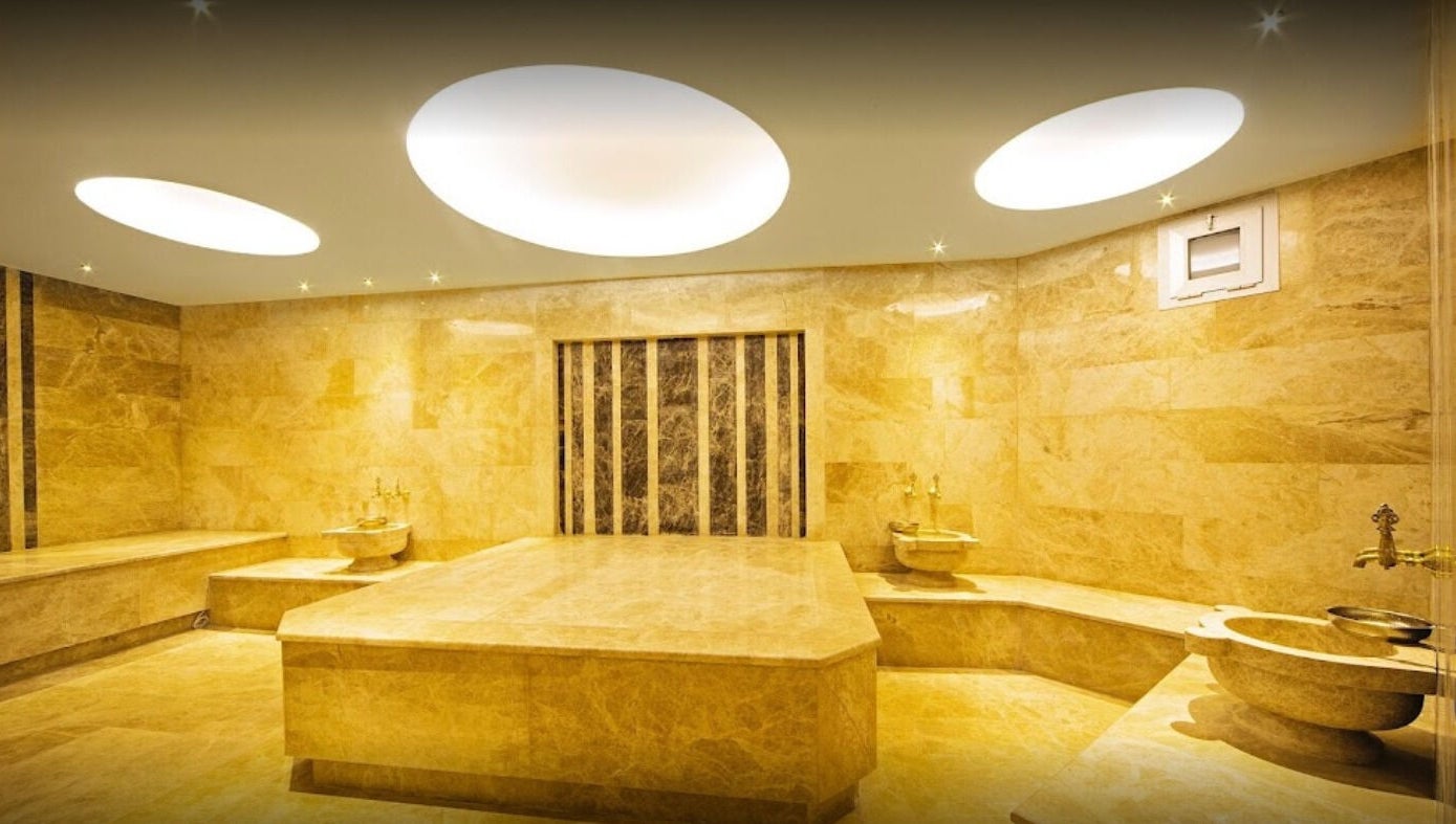 Elegant marble interior of Artemis Spa in Poseidon Hotel, Muğla, TR, showcasing luxury and tranquility.