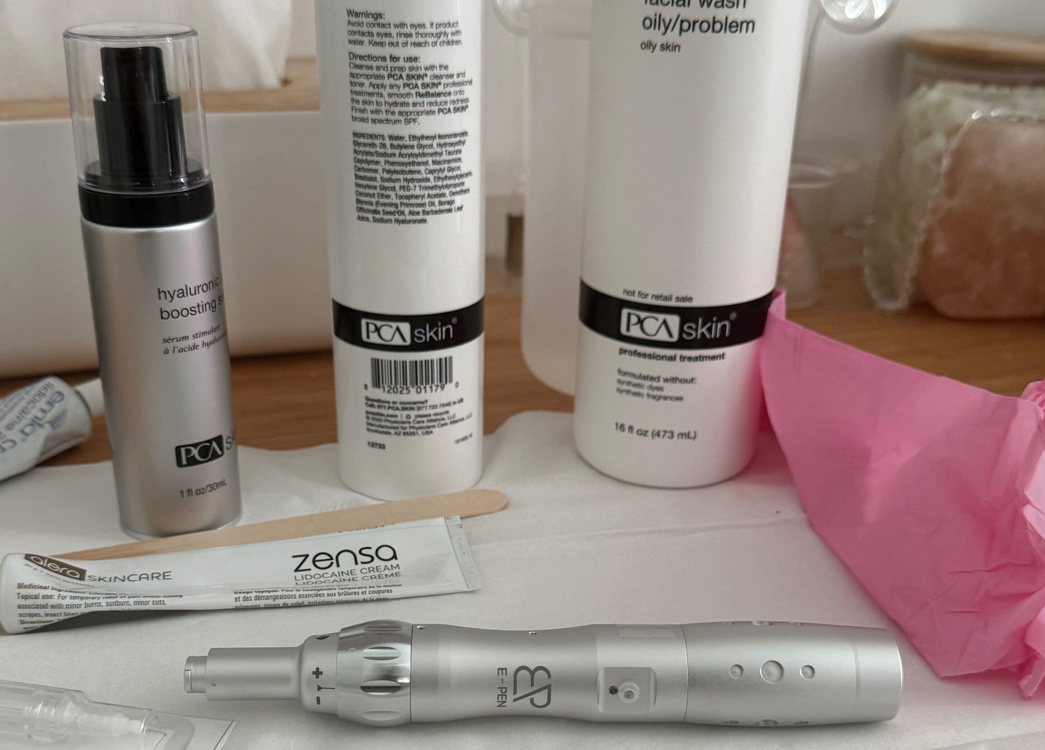 PCA skin care products at Kēp Esthetique, Montréal, Québec, CA. Premium skincare displayed on a wooden surface.