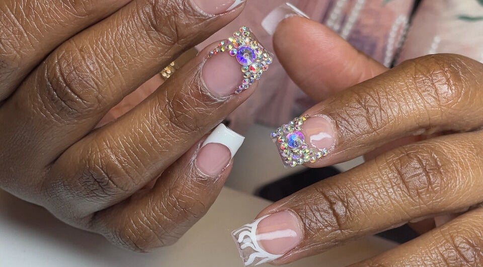 Intricate nail art with gems by Christals Acrylix at Pretty High Maintenance Day Spa, Simpsonville, South Carolina, US.