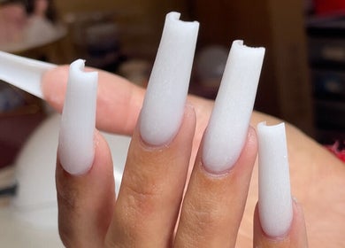 Stylish white acrylic nails by Christals Acrylix at Pretty High Maintenance Day Spa, Simpsonville, South Carolina, US.