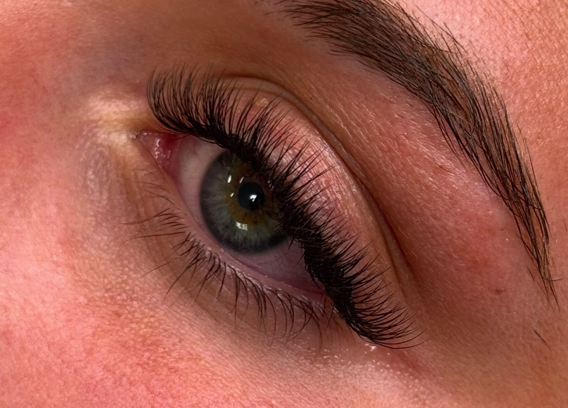 Detailed closeup of eyelash extensions at PS: You're Beautiful in Sittingbourne, England, GB.