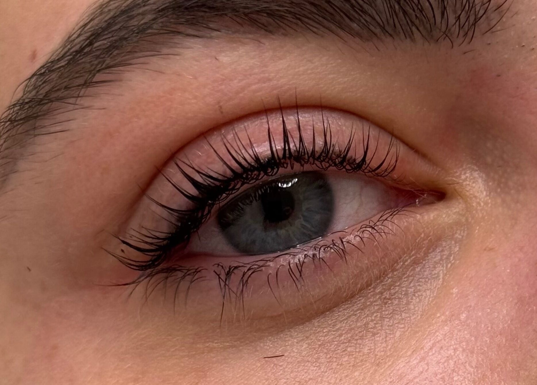 Close-up of beautifully enhanced eyelashes at PS : You're Beautiful, Sittingbourne, England, GB.