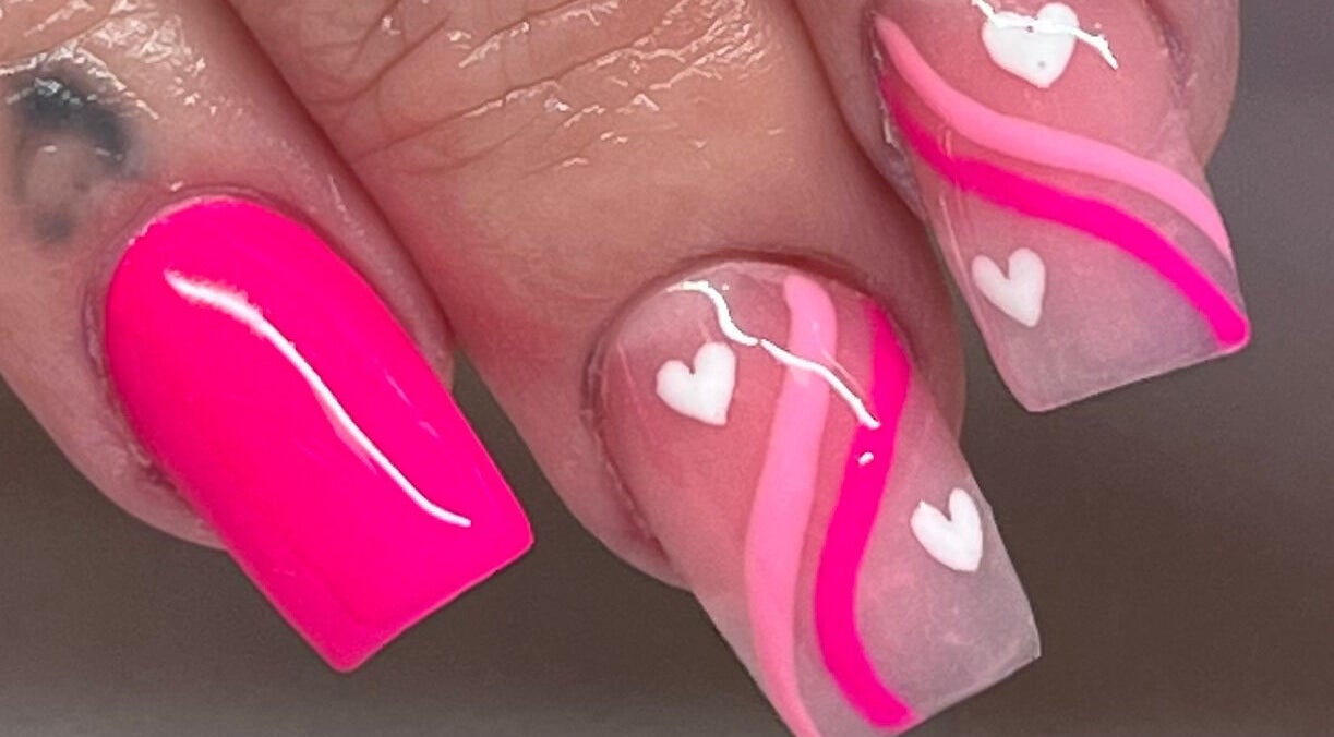 Close-up of heart-streaked acrylic nails at Nails by Amy McDonald, Kirkcaldy, Scotland, GB.