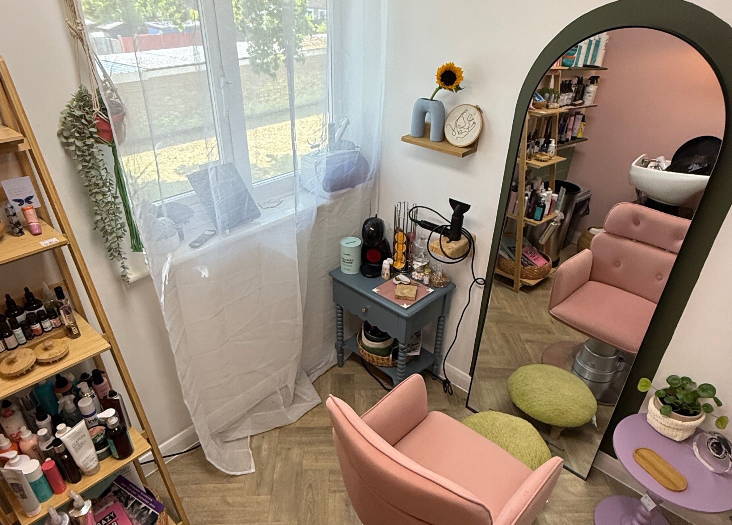 Cozy salon setup at The Craft Hairdresser, Botley, England, GB with stylish decor and a plush chair.