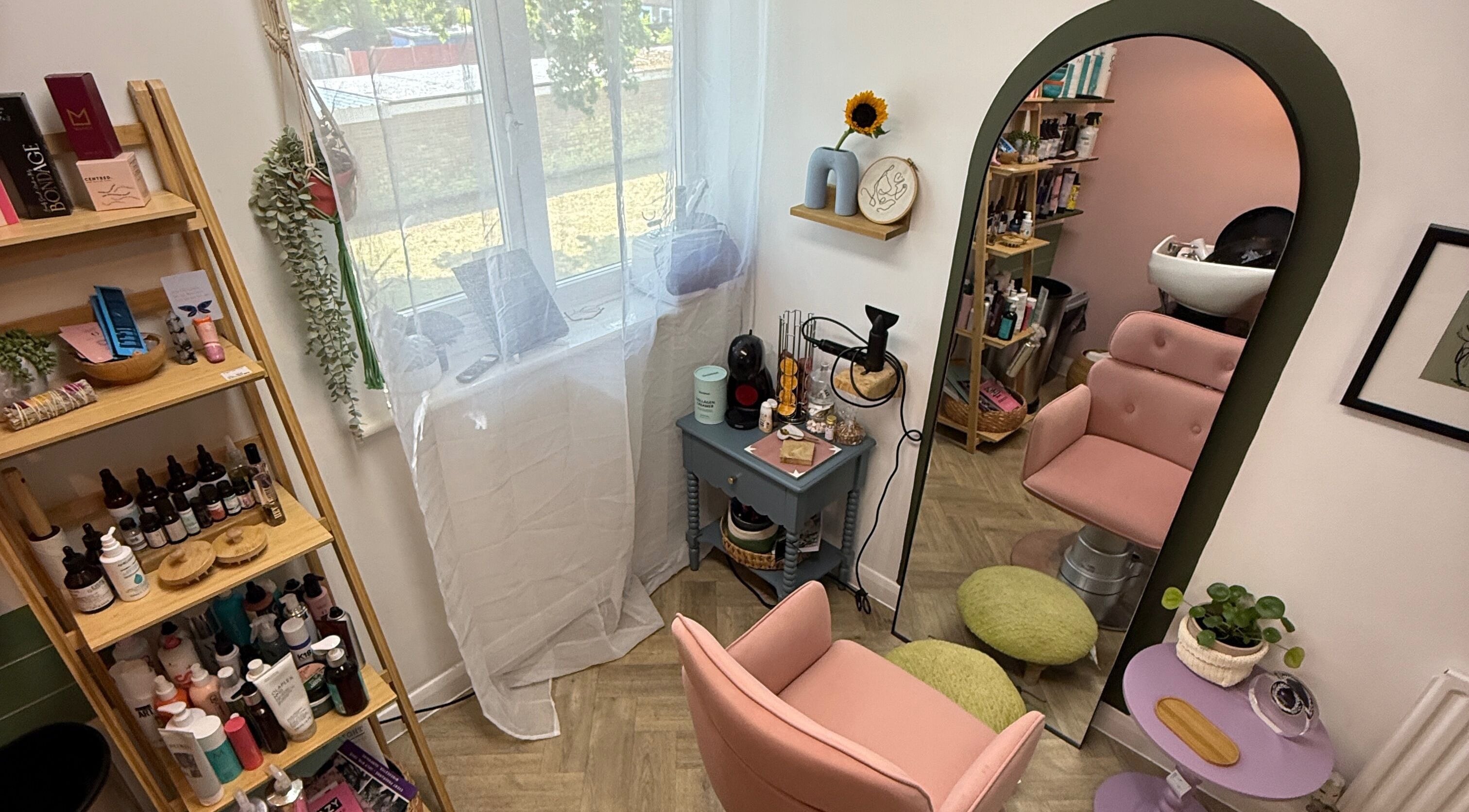 Cozy salon setup at The Craft Hairdresser, Botley, England, GB with stylish decor and a plush chair.