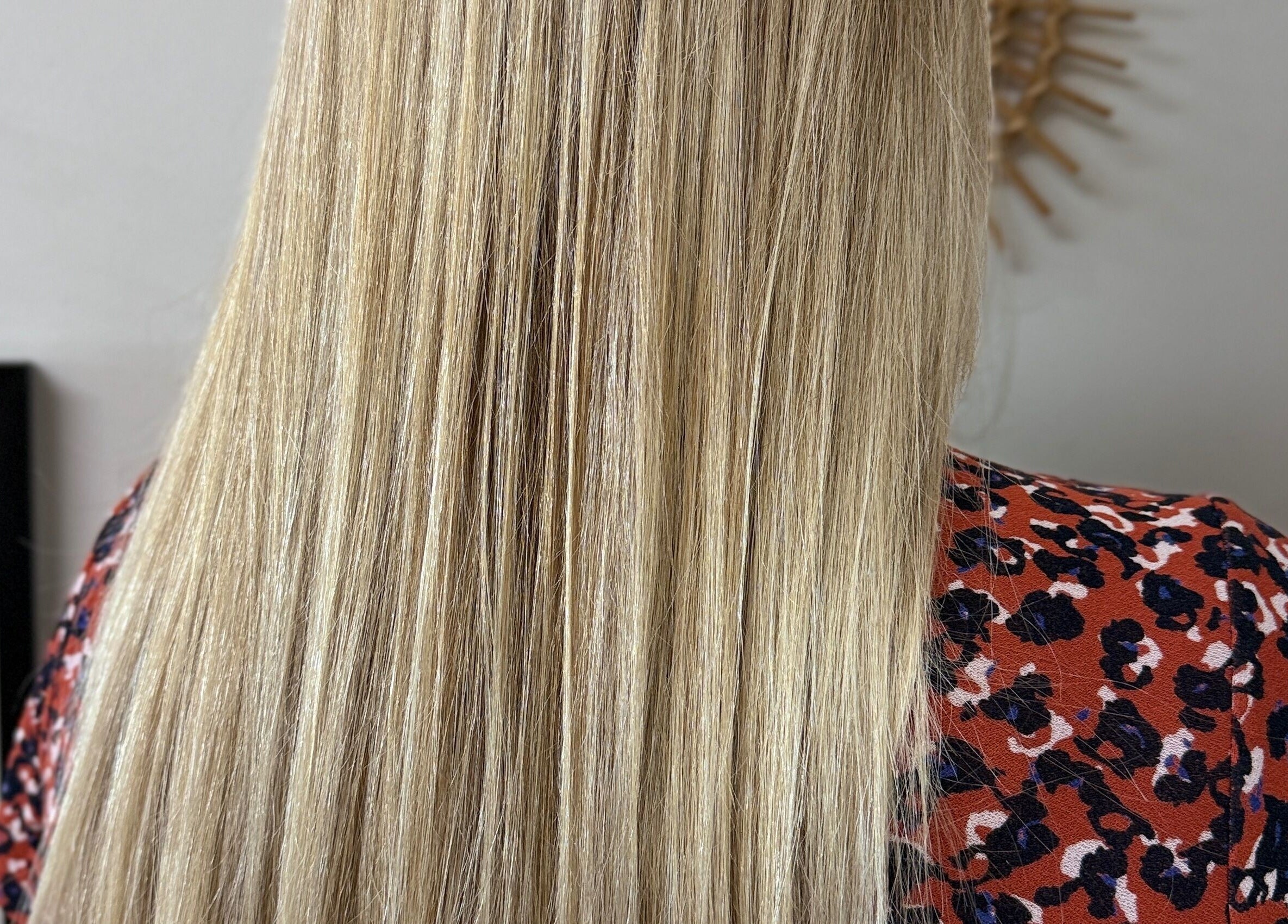 Smooth blonde hair styled at The Craft Hairdresser, Botley, England, GB, showcasing professional styling.