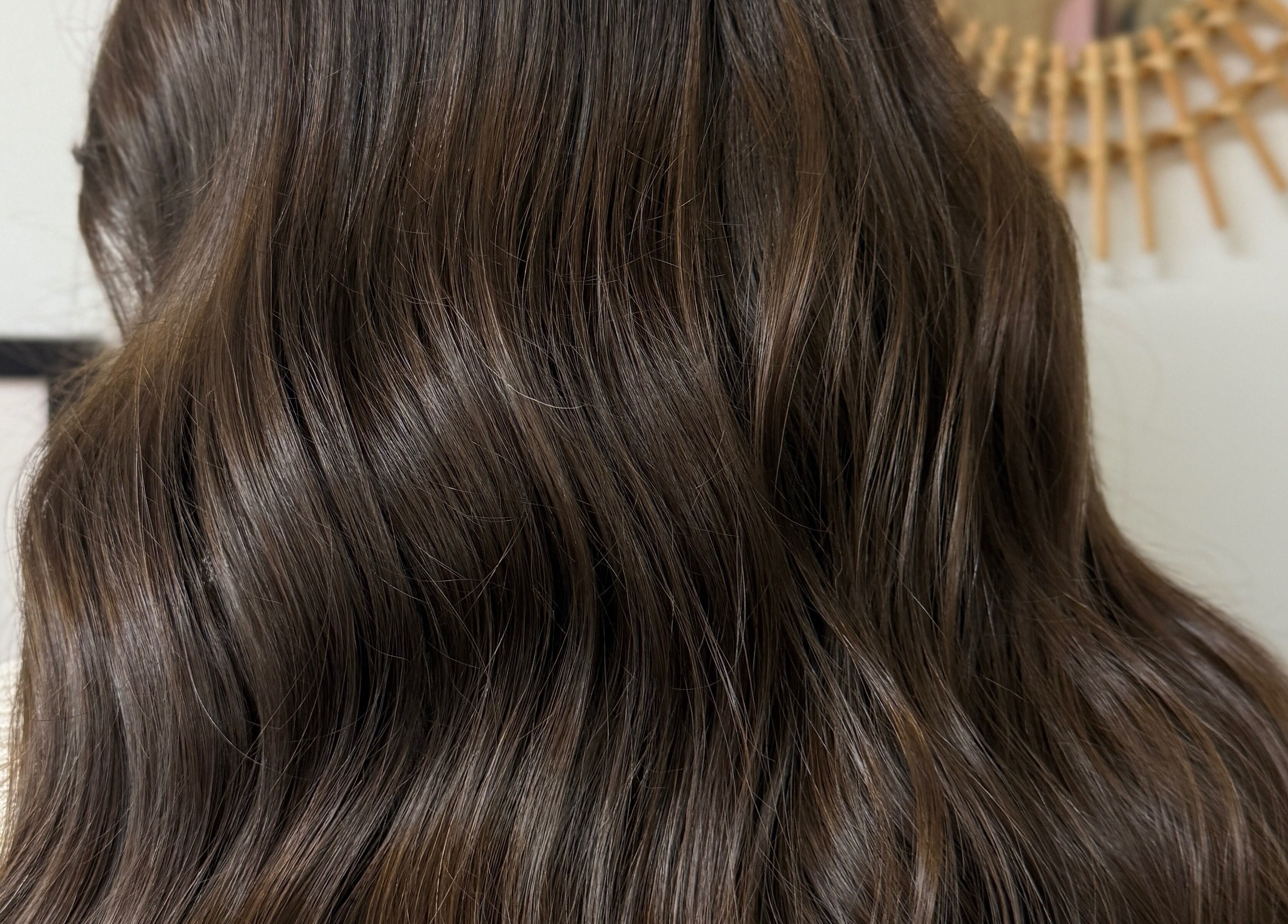 Luxurious, shiny wavy hair styled at The Craft Hairdresser in Botley, England, GB.