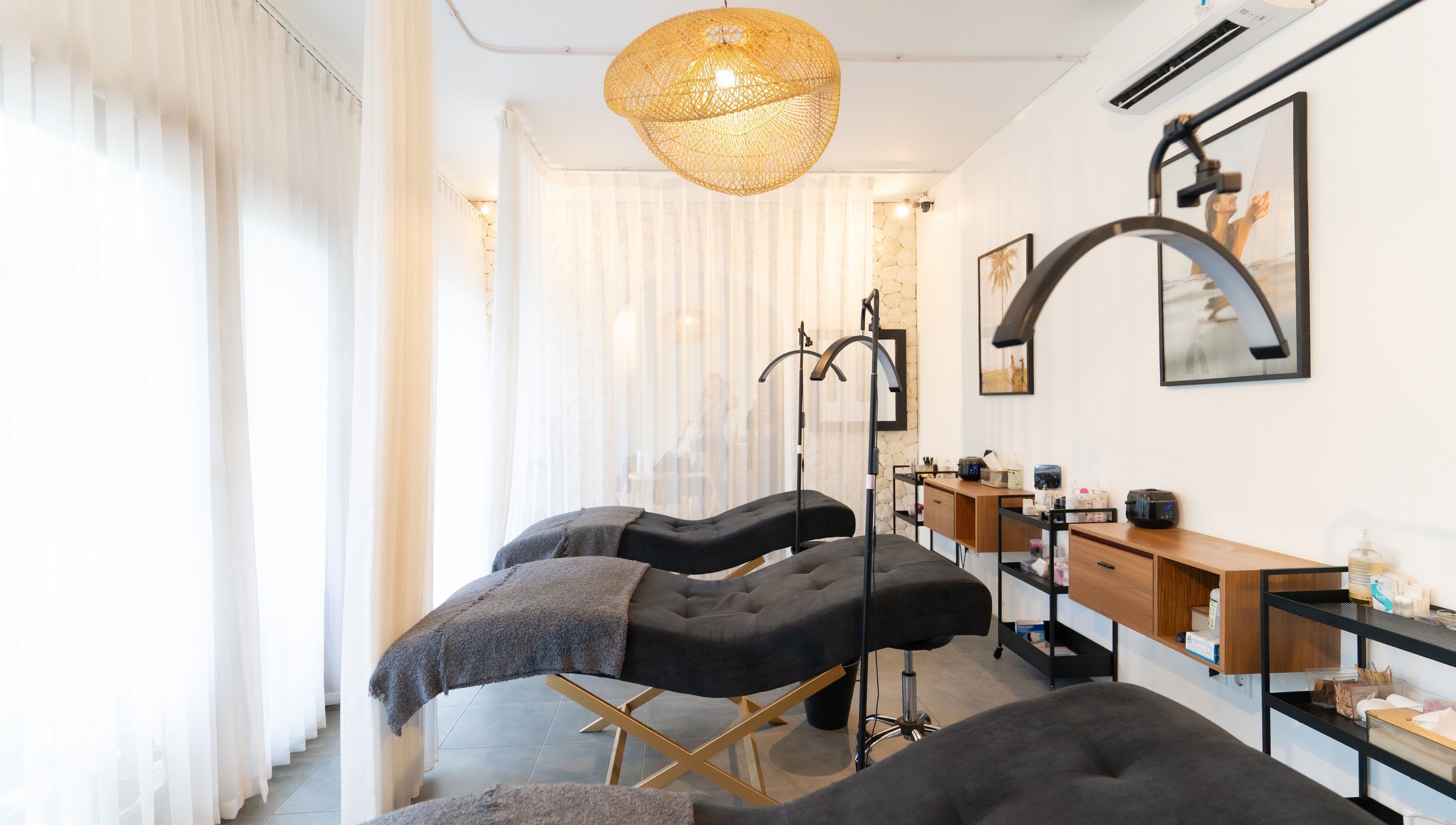 Luxurious spa beds in a serene room at Luxe Co. Bali, Bali, ID, showcasing elegance and comfort.