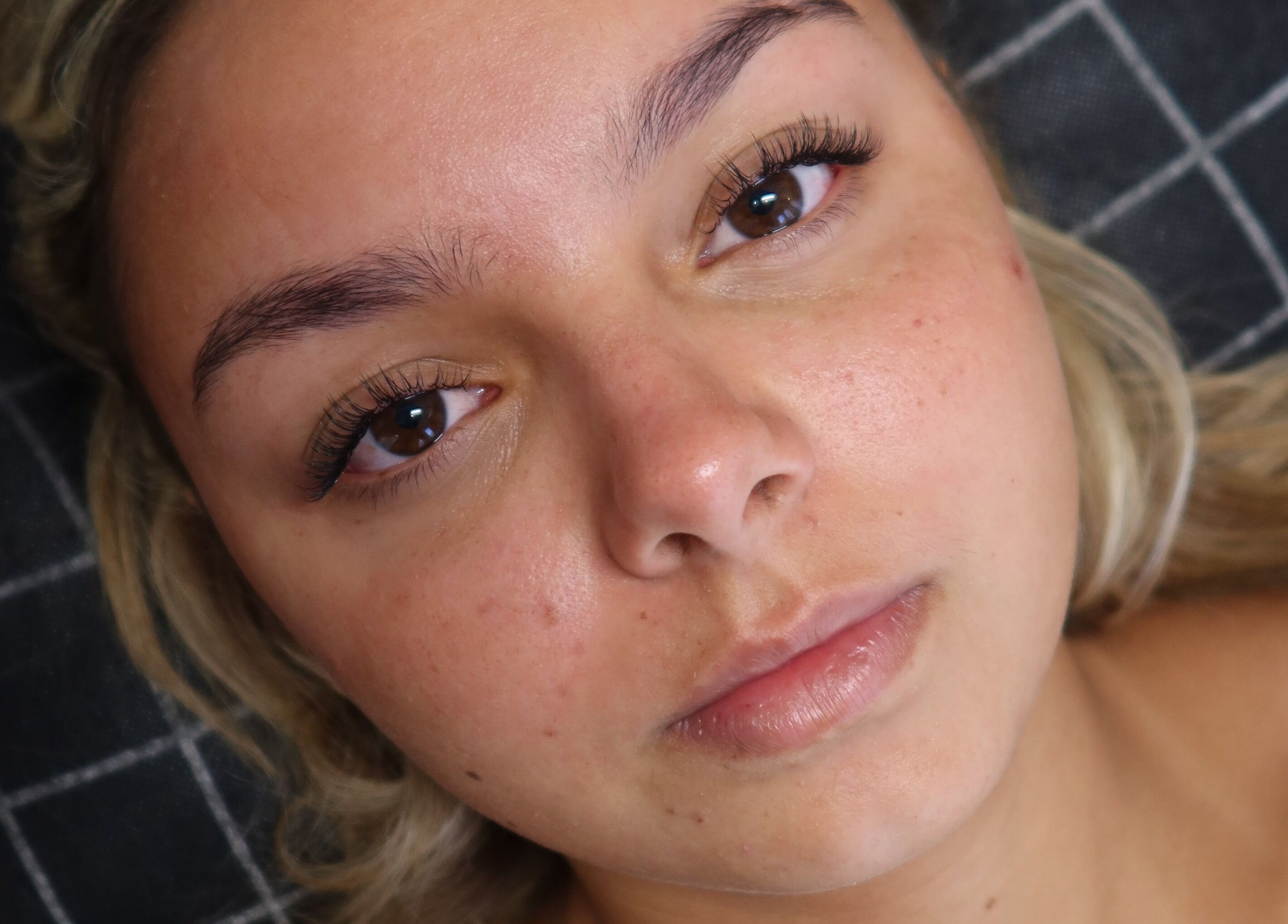 Close-up of a relaxed face at Luxe Co. Bali, Bali, ID showcasing natural beauty and wellness.