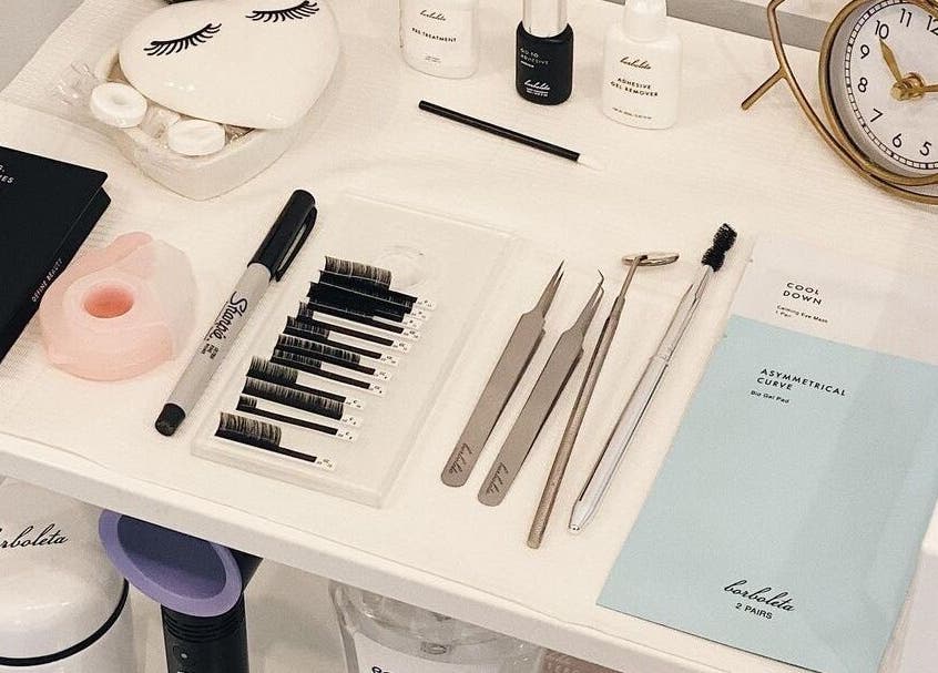Eyelash extension tools and products at Curated Beauty & Aesthetics in Brooks, Alberta, CA.