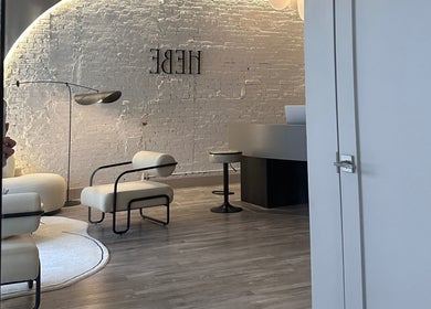 Chic interior of HELA Skincare- Midtown with modern seating and decor in New York, New York, US.
