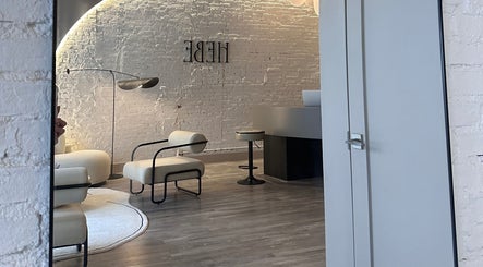 Chic interior of HELA Skincare- Midtown with modern seating and decor in New York, New York, US.