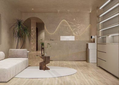Relaxing lounge at HELA Skincare- Flushing, New York, New York, US with modern decor and comfortable seating.