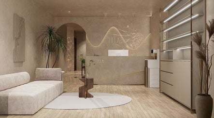 Relaxing lounge at HELA Skincare- Flushing, New York, New York, US with modern decor and comfortable seating.