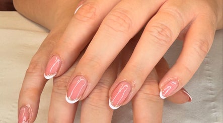Manicured nails with pink polish at 19 Beauty Room, Leigh, England, GB.