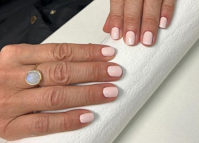 Beautiful pastel manicure at 19 Beauty Room, Leigh, England, GB. Showcasing pristine nail art.