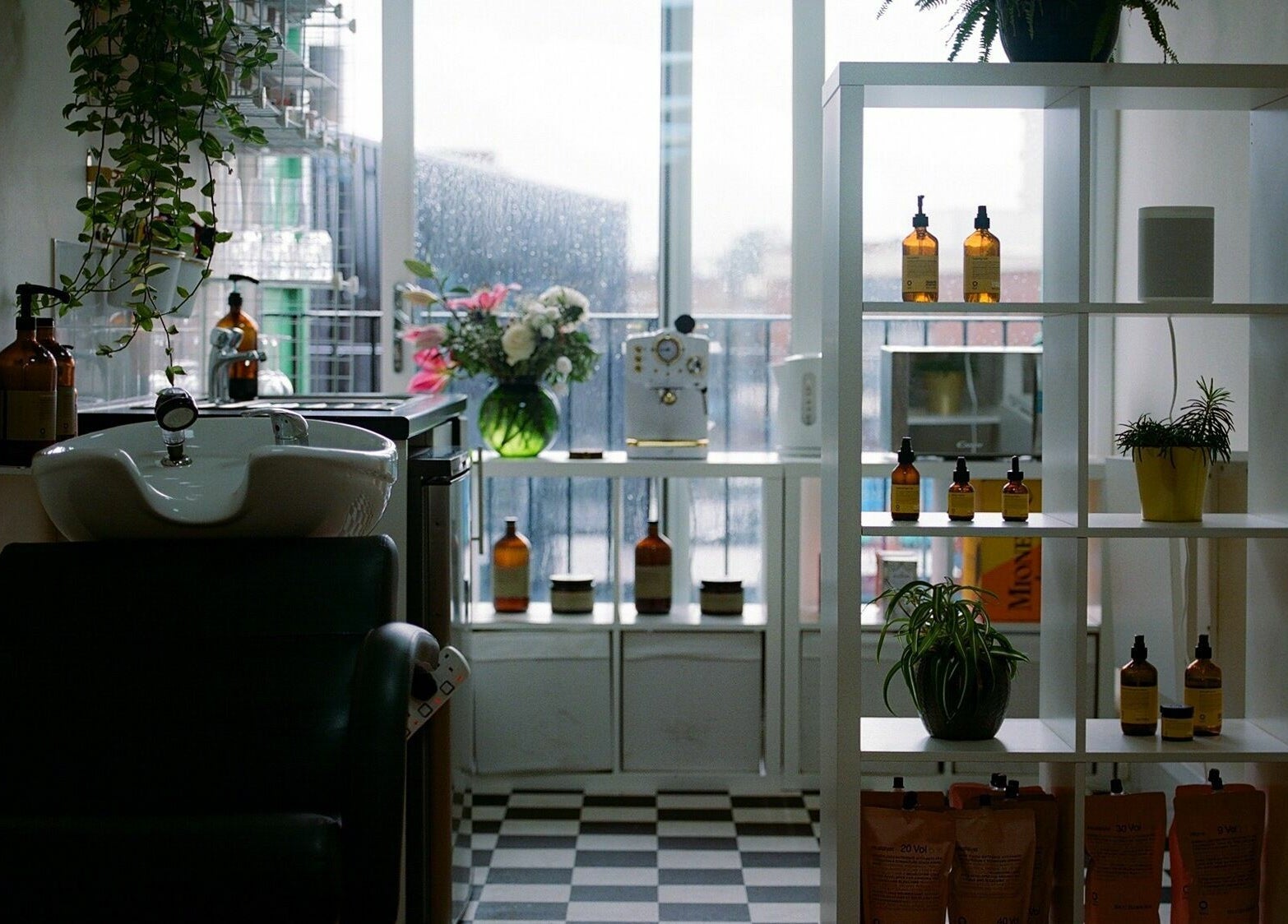 Modern salon space at Barnet Fair in London, England, GB with stylish decor and sleek beauty products.