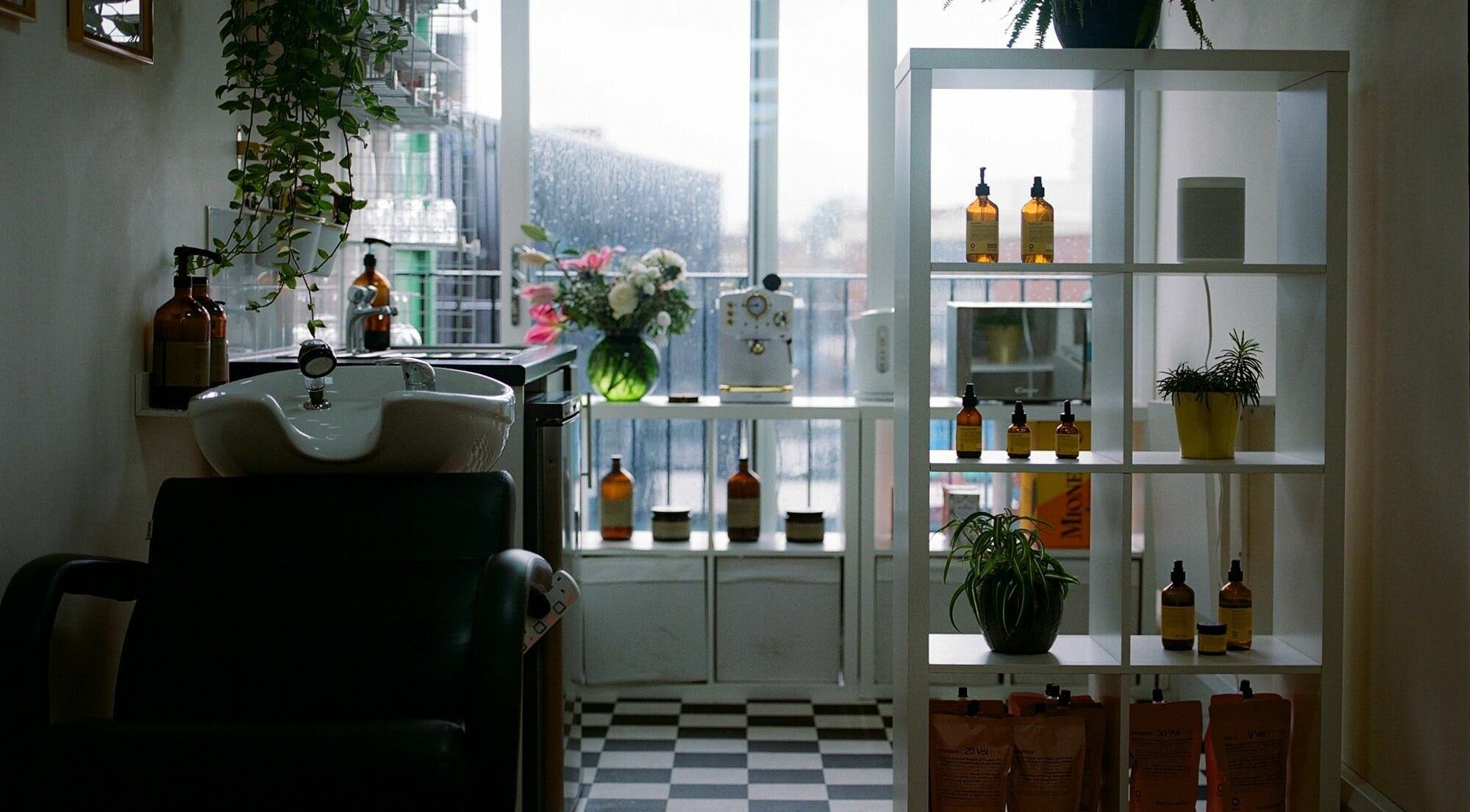 Modern salon space at Barnet Fair in London, England, GB with stylish decor and sleek beauty products.