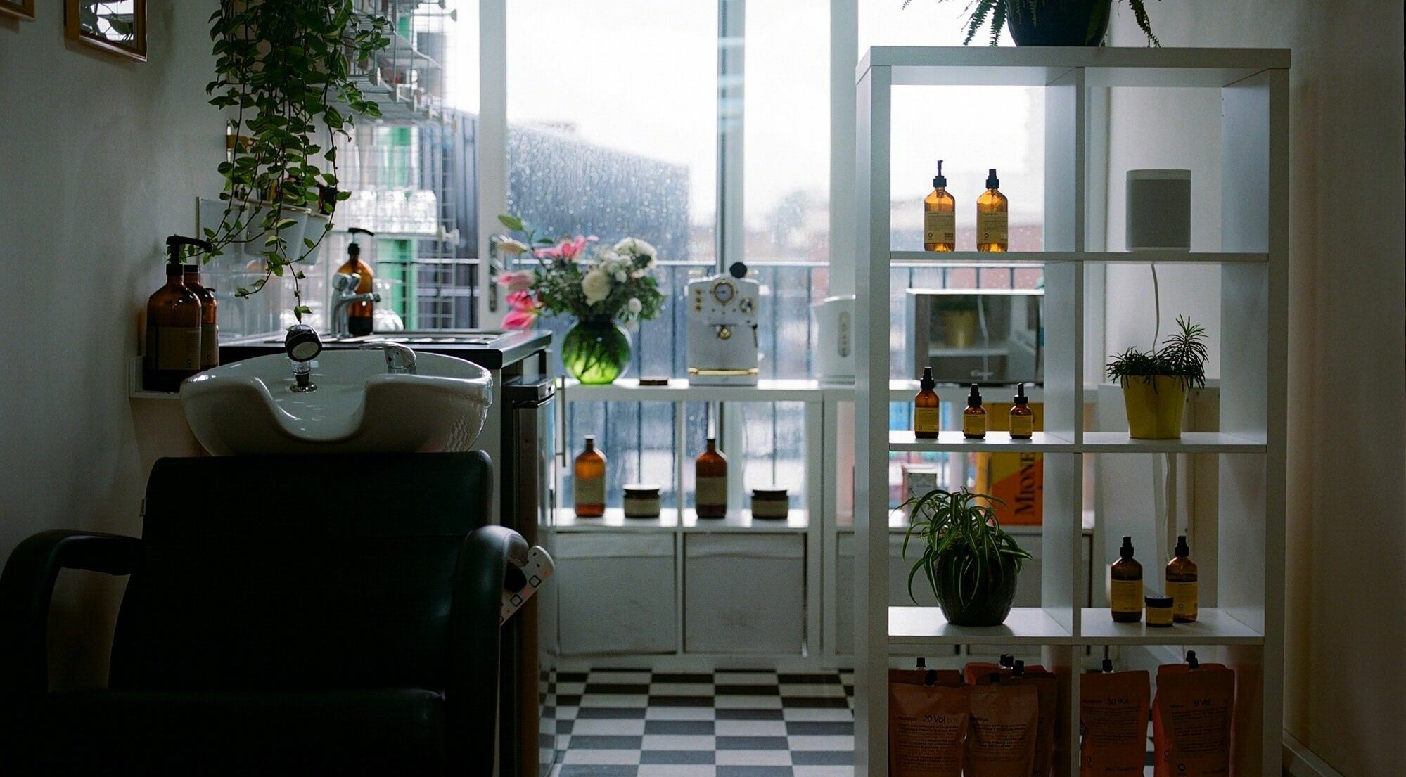 Modern salon space at Barnet Fair in London, England, GB with stylish decor and sleek beauty products.