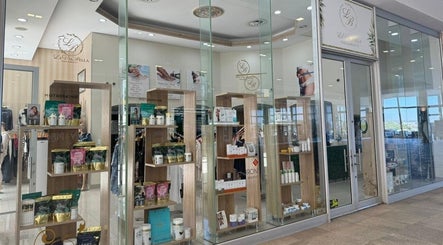 La Via Bella Nails & Beauty in Johannesburg, Gauteng, ZA, showcasing stylish front glass displays and premium products.