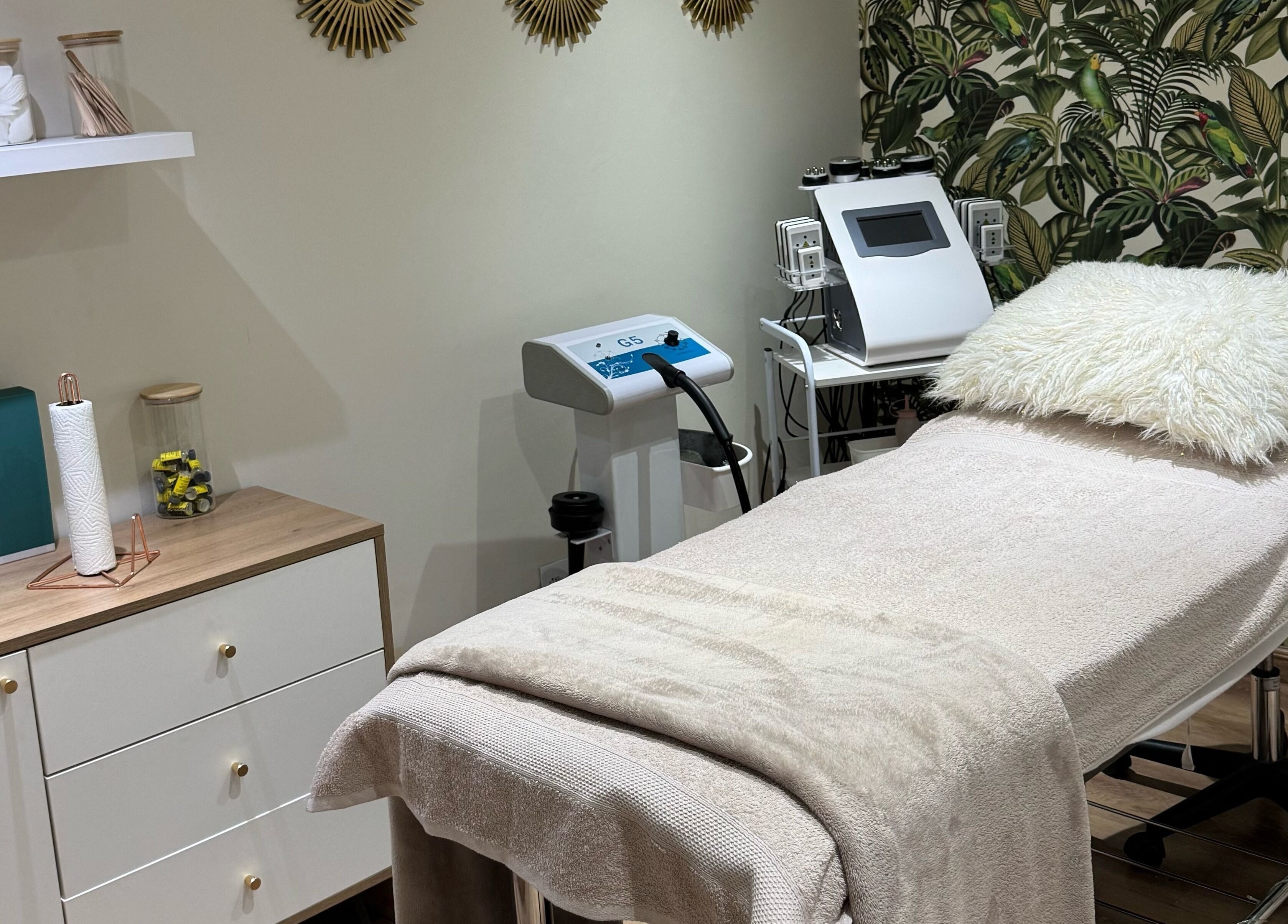 Calming spa room at La Via Bella Nails & Beauty in Johannesburg, Gauteng, ZA, featuring plush treatment bed.