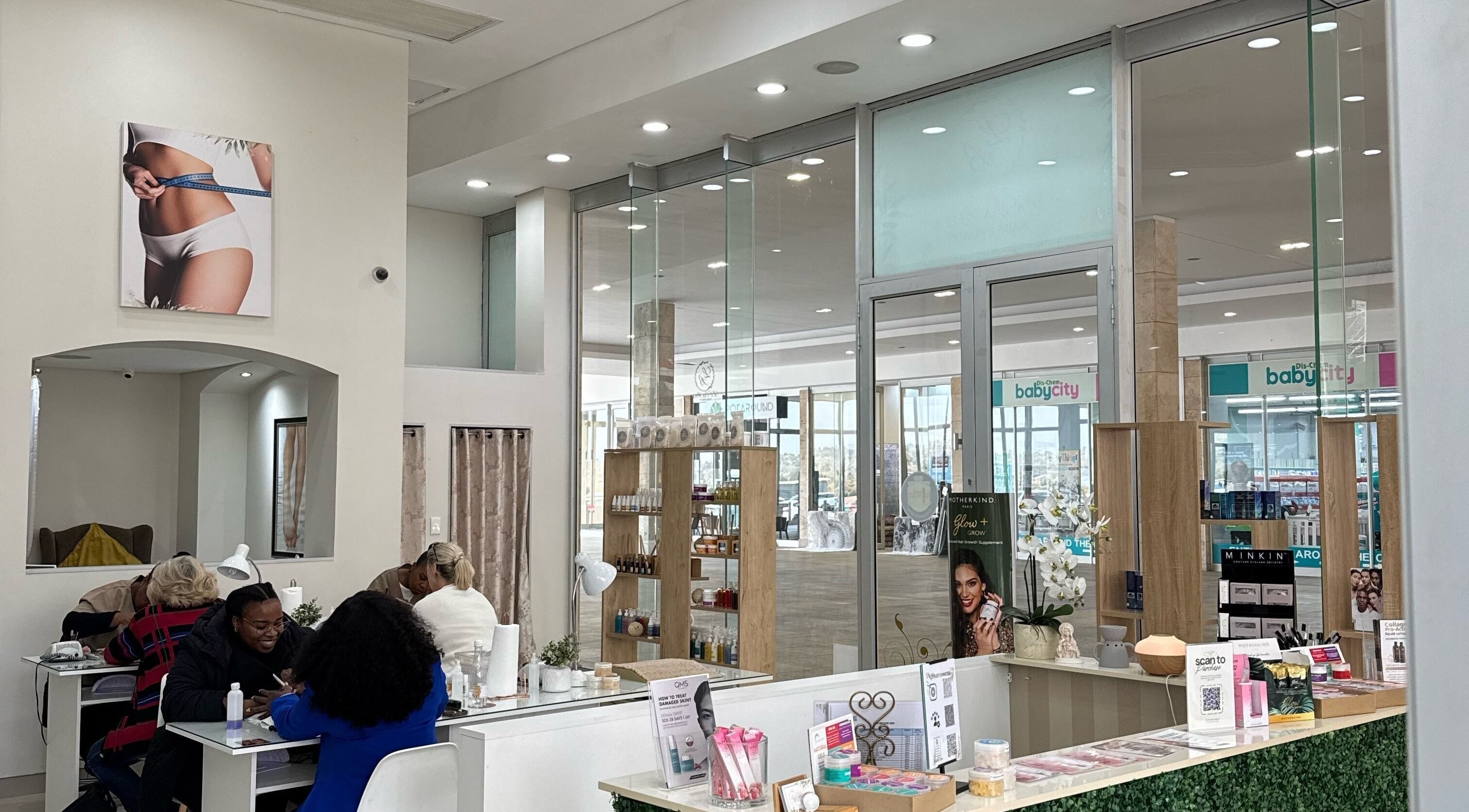 Modern interior of La Via Bella Nails & Beauty in Johannesburg, Gauteng, ZA showcasing nail stations and products.