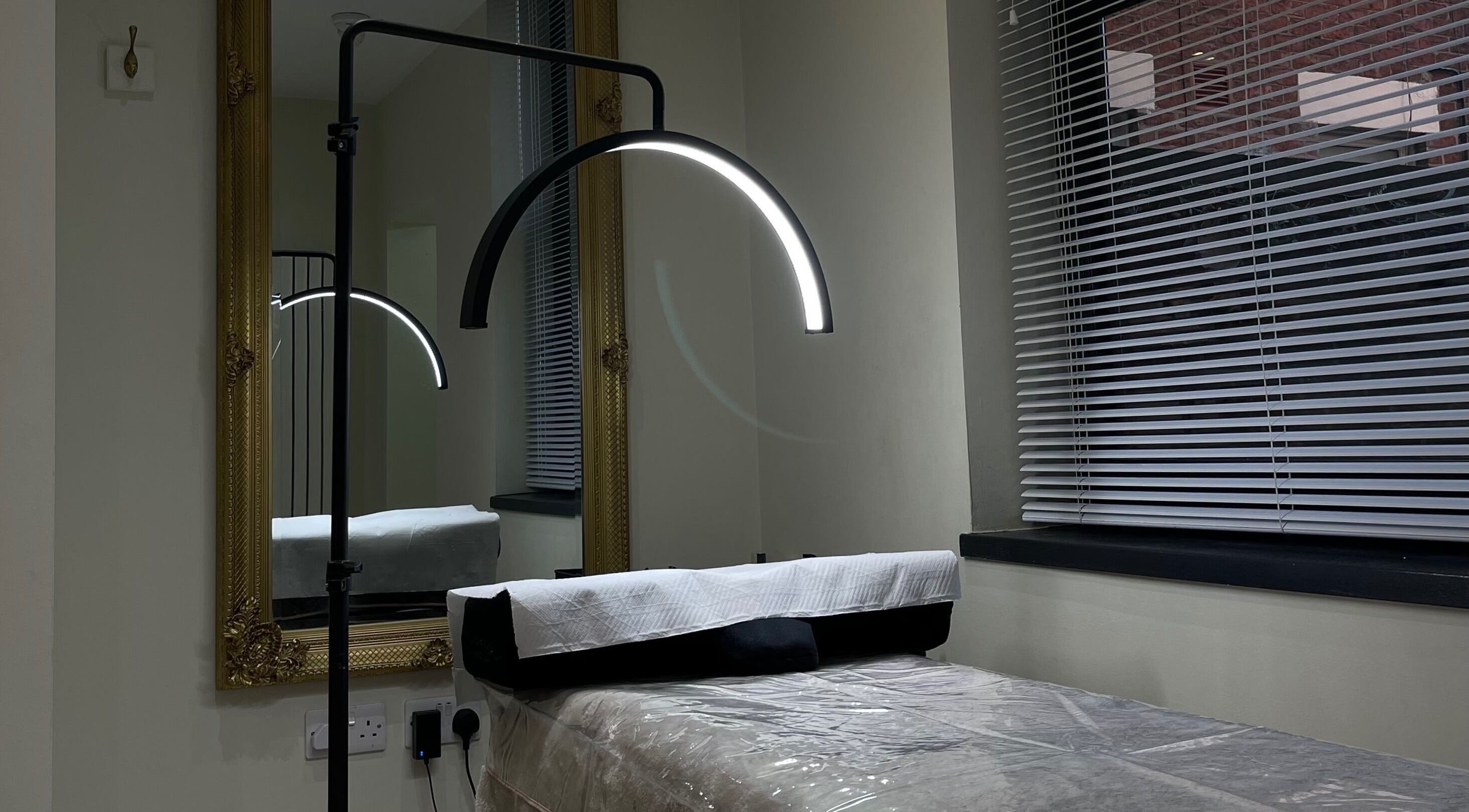 Cozy treatment room at By Brandon Hartley in Preston, England, GB featuring elegant decor and modern lighting.