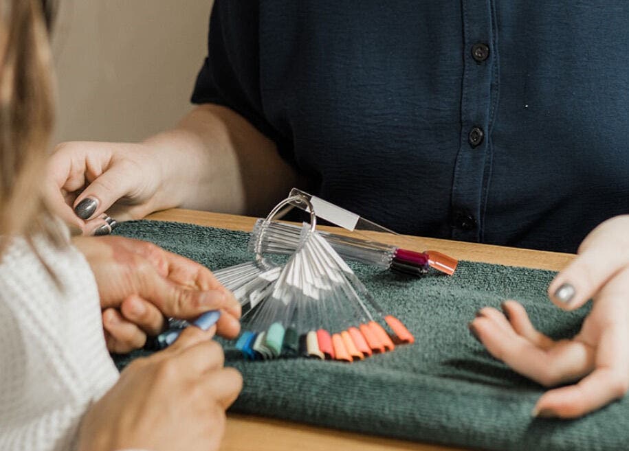 Detailed nail color selection at Treatment Rooms, Hastings, England, GB.