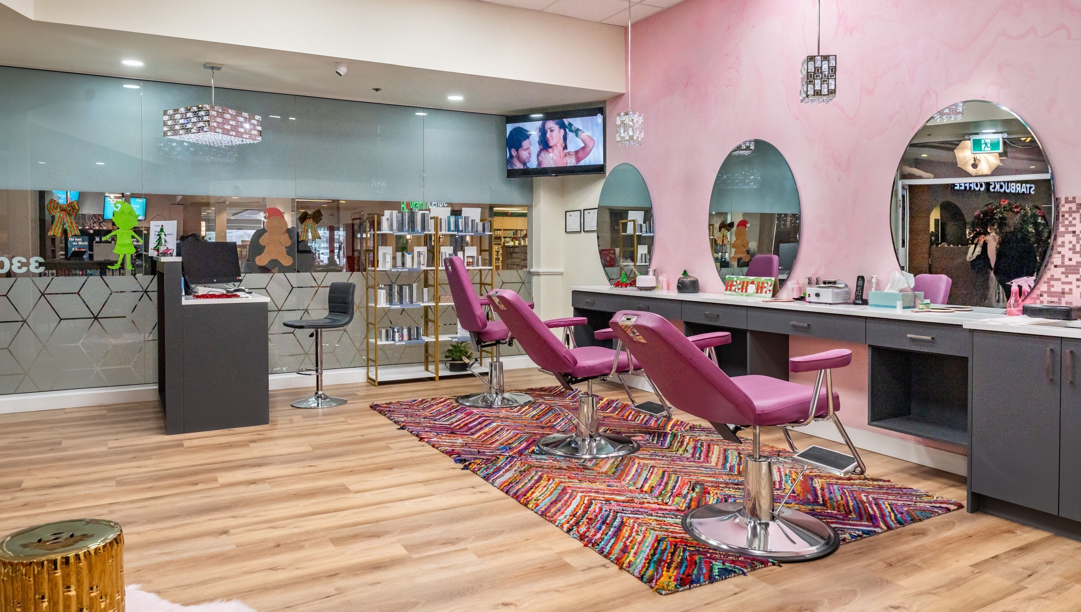 Namaste Beauty salon features chic pink decor and modern mirrors at Maple Ridge #330, British Columbia, CA.
