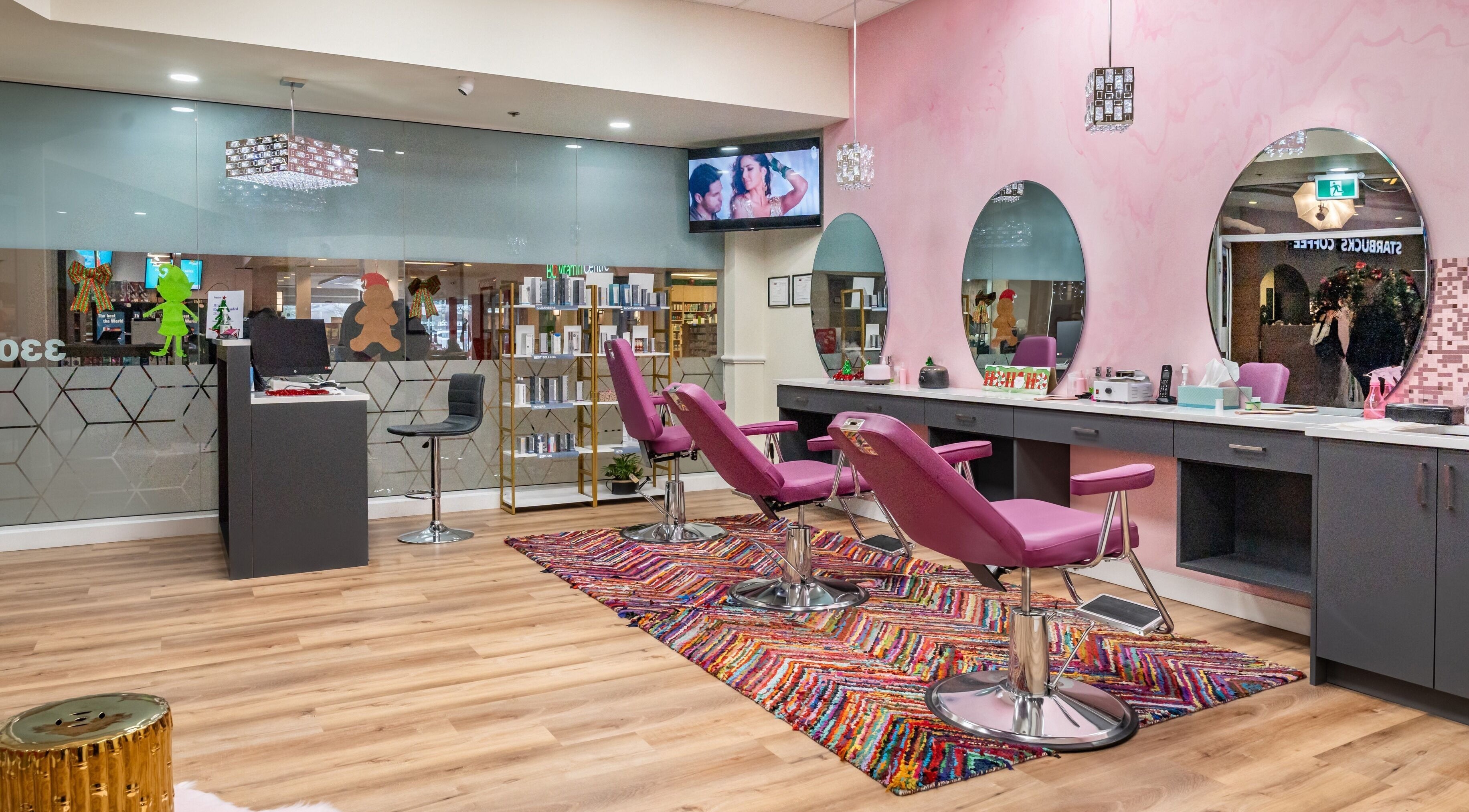 Namaste Beauty salon features chic pink decor and modern mirrors at Maple Ridge #330, British Columbia, CA.