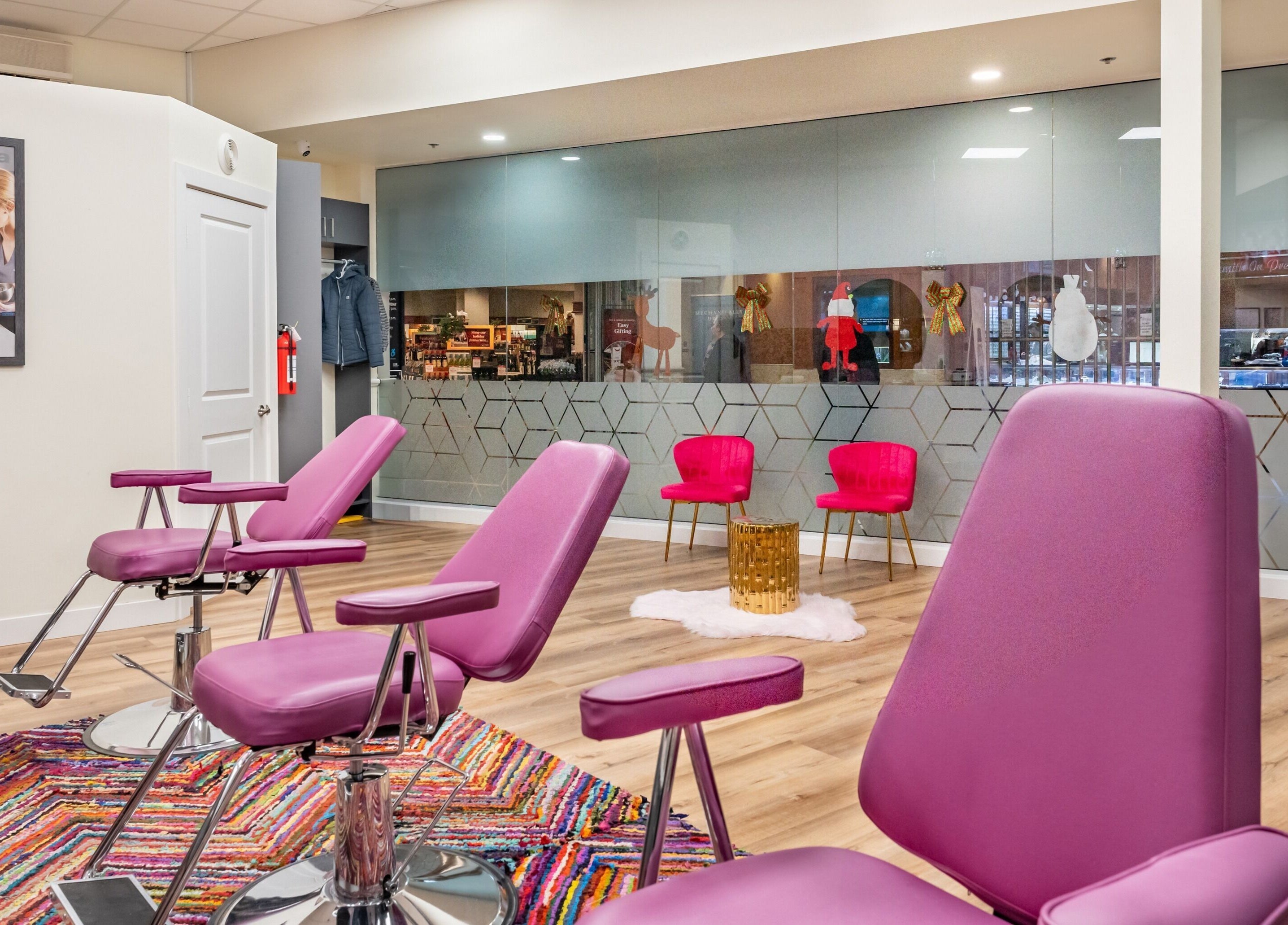 Modern pink chairs at Namaste Beauty, Maple Ridge #330, British Columbia, CA, creating a welcoming salon ambiance.