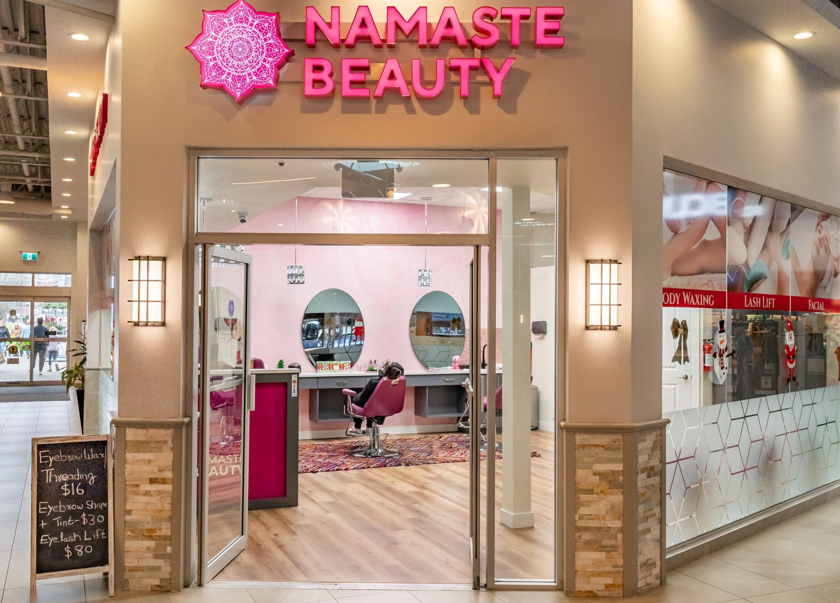 Entrance of Namaste Beauty in Maple Ridge #330, British Columbia, displaying a chic interior with pink accents.