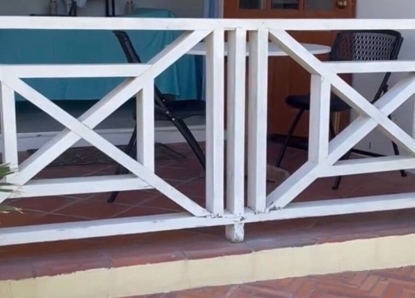 Stylish patio entrance at Khulula Therapy, Saint James, BB, showcasing cozy outdoor setting.