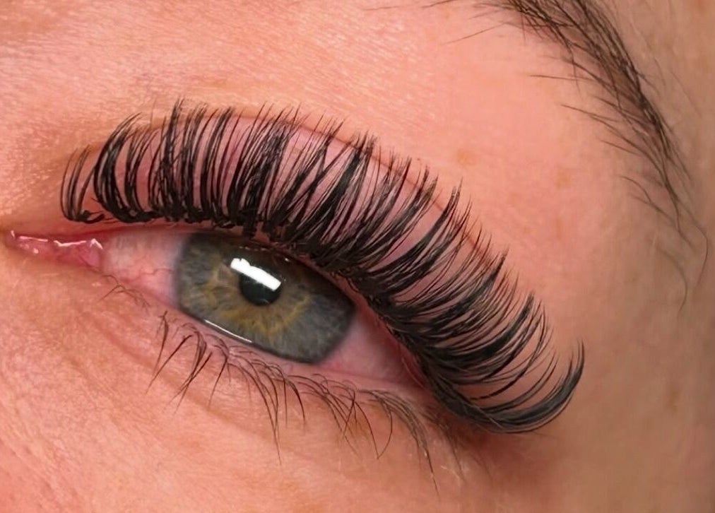 Close-up of expertly applied eyelash extensions at Aesthetics by Amie, Calgary, Alberta, CA.