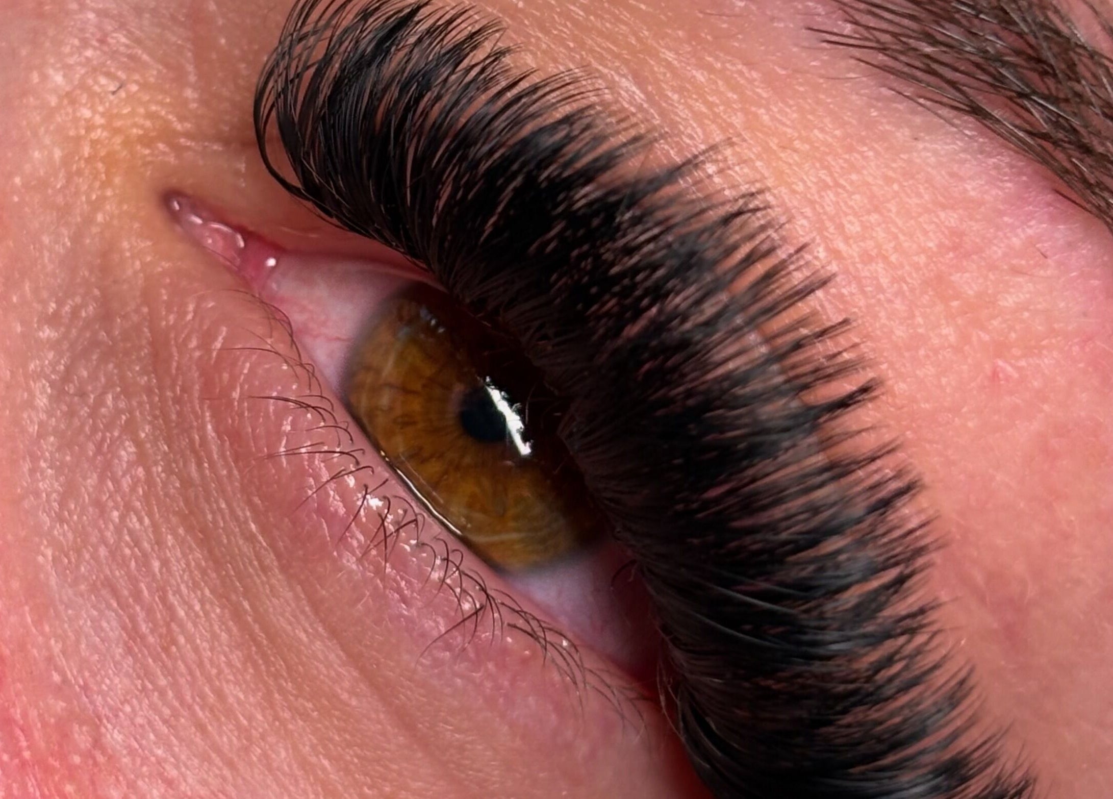 Close-up of lush eyelash extensions from Aesthetics by Amie, Calgary, Alberta, CA.