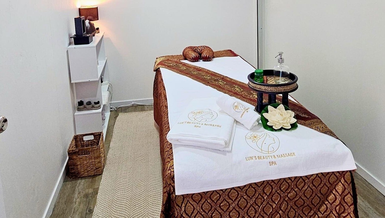 Relaxing treatment room at Lun's Beauty and Massage Spa, Redcliffe, Queensland, AU featuring a massage table.