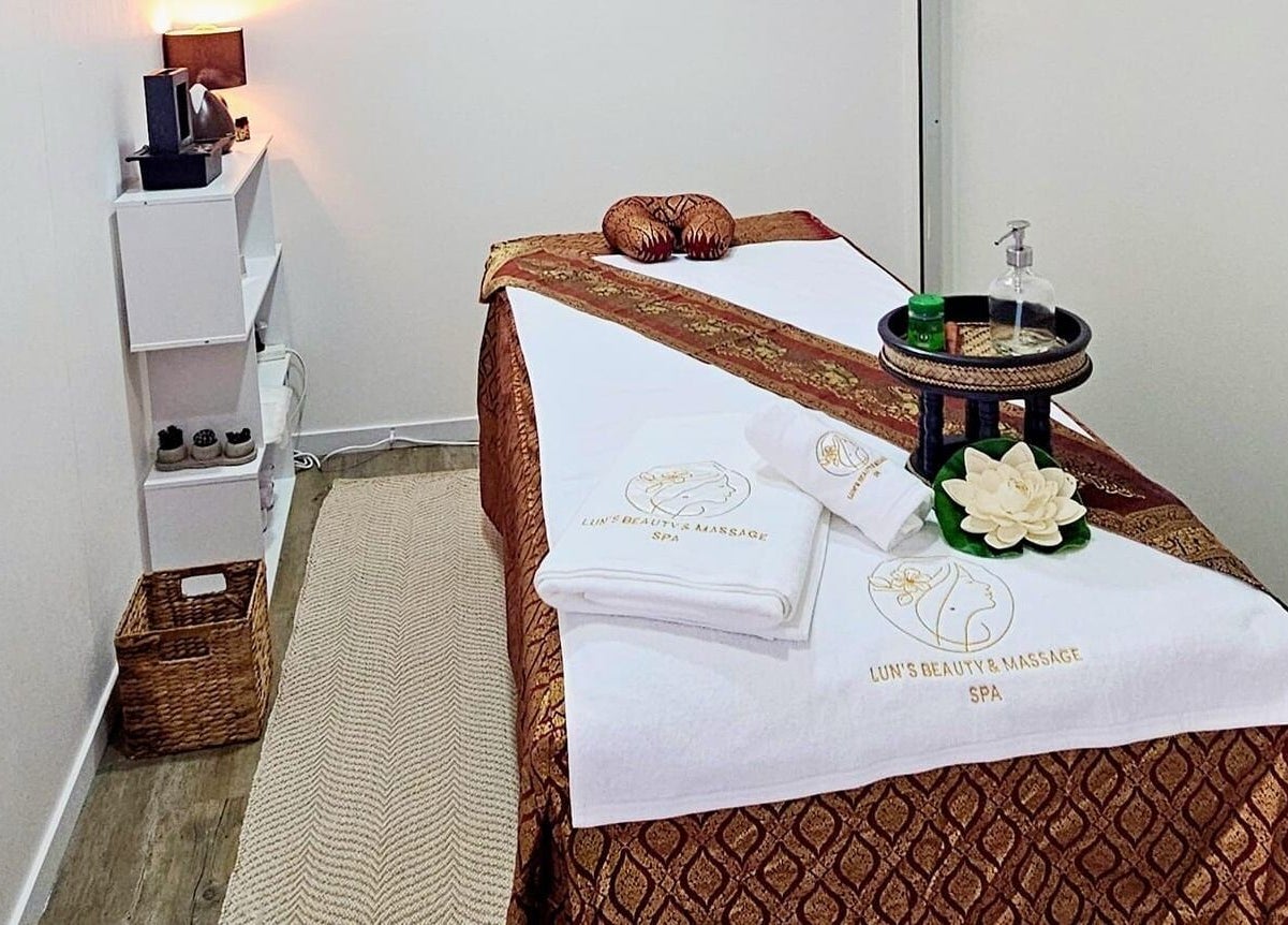 Relaxing treatment room at Lun's Beauty and Massage Spa, Redcliffe, Queensland, AU featuring a massage table.