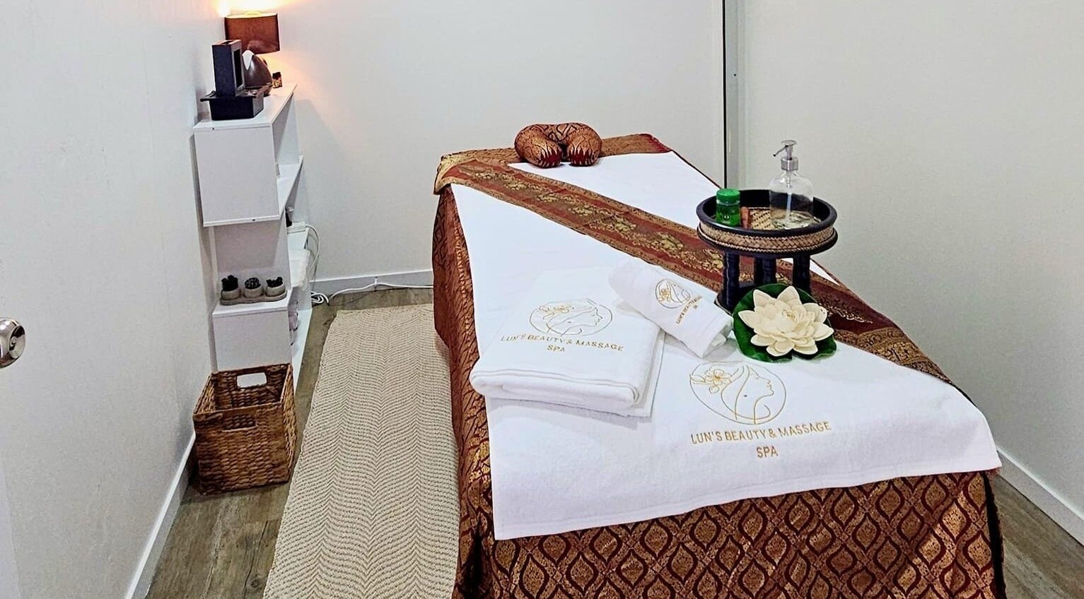 Relaxing treatment room at Lun's Beauty and Massage Spa, Redcliffe, Queensland, AU featuring a massage table.