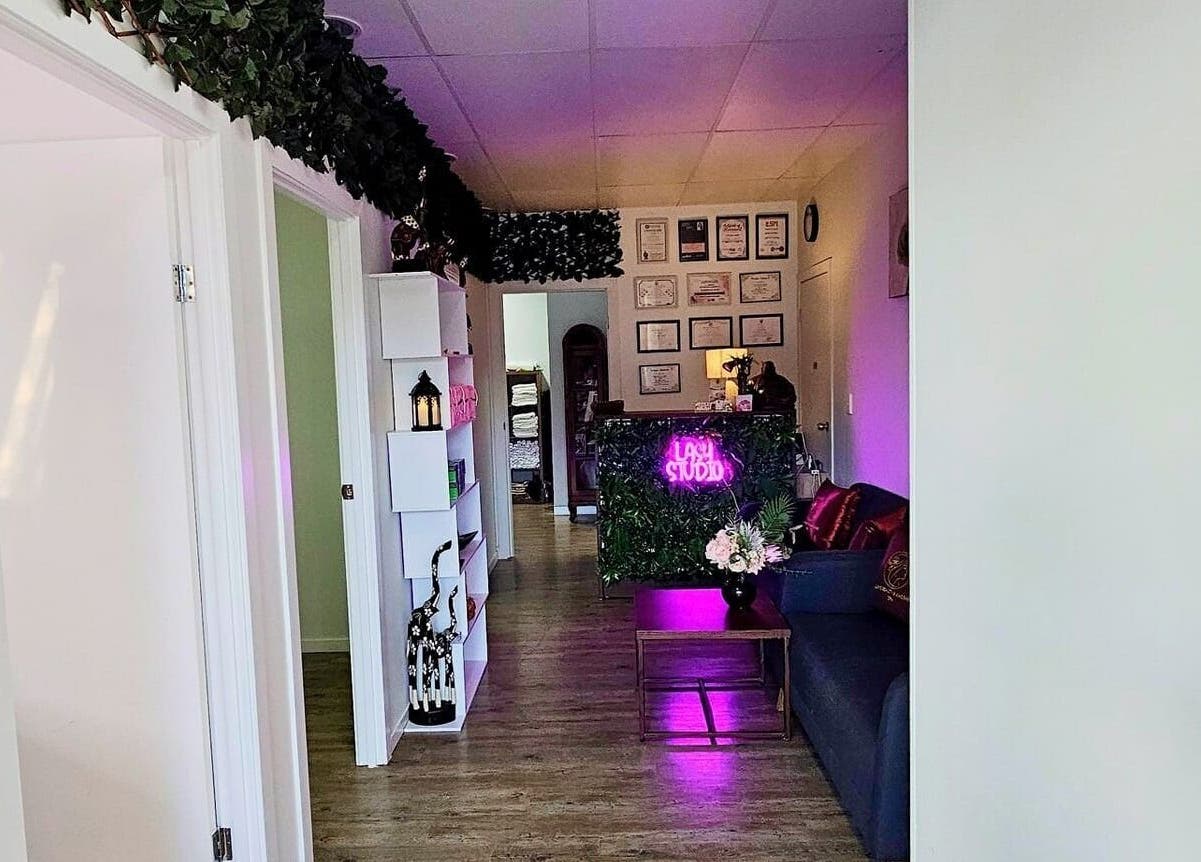Cozy reception at Lun's Beauty and Massage Spa, Redcliffe, Queensland, AU, with inviting decor and ambient lighting.