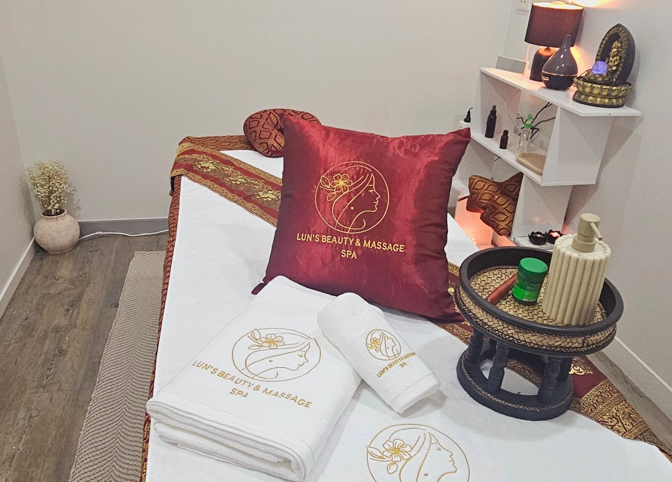 Relaxing massage suite at Lun's Beauty and Massage Spa in Redcliffe, Queensland, AU with decor and spa essentials.
