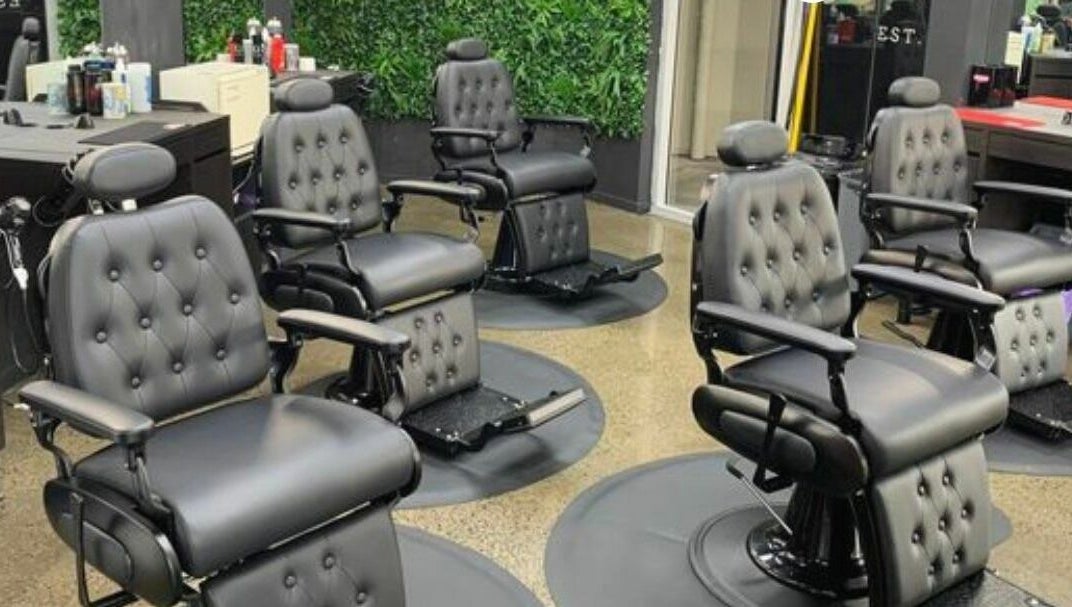 Modern barber chairs at Lole's Barber Shop - Commercial Drive in Springfield, Queensland, AU.