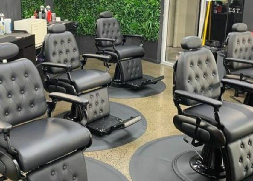 Modern barber chairs at Lole's Barber Shop - Commercial Drive in Springfield, Queensland, AU.