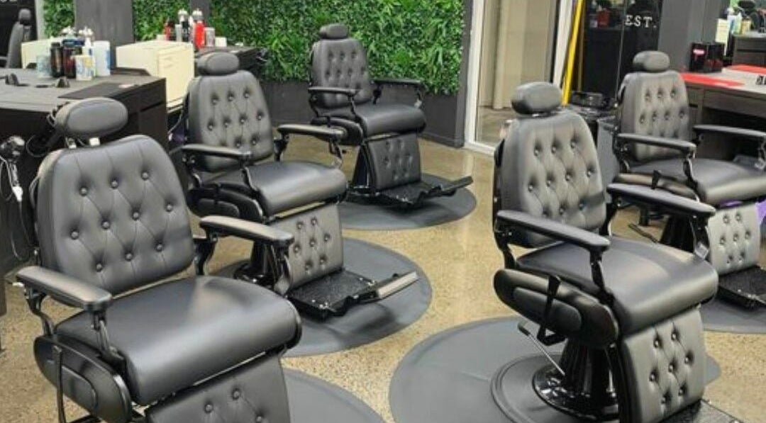 Modern barber chairs at Lole's Barber Shop - Commercial Drive in Springfield, Queensland, AU.