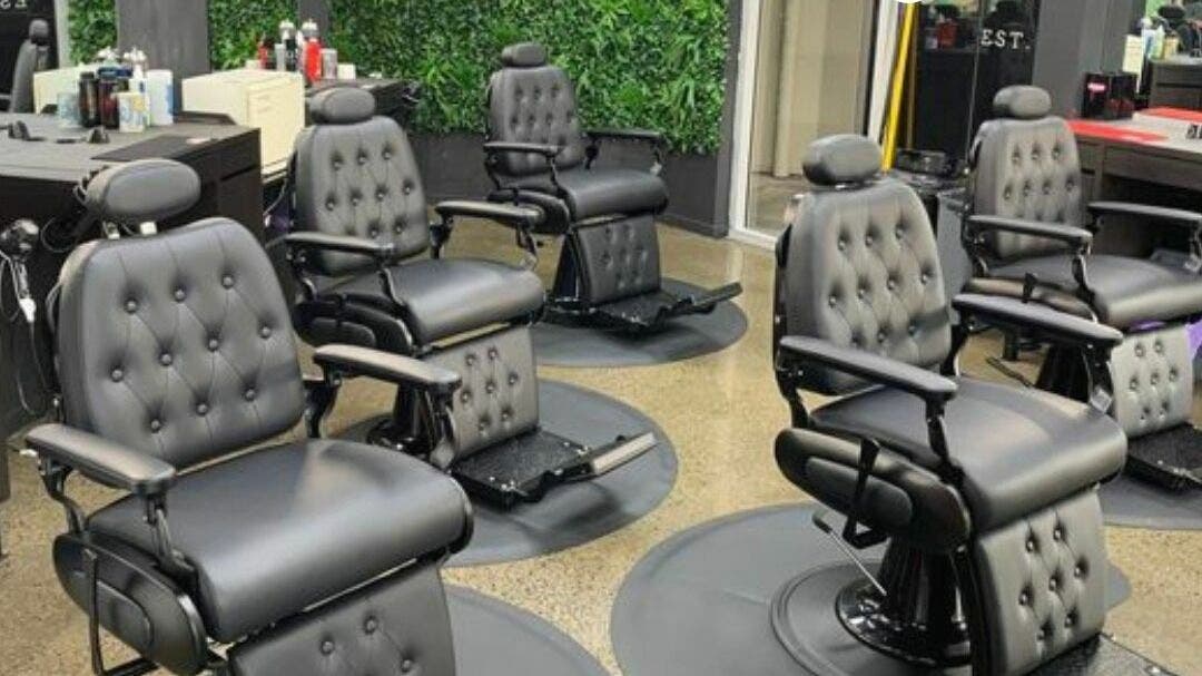 Modern barber chairs at Lole's Barber Shop - Commercial Drive in Springfield, Queensland, AU.