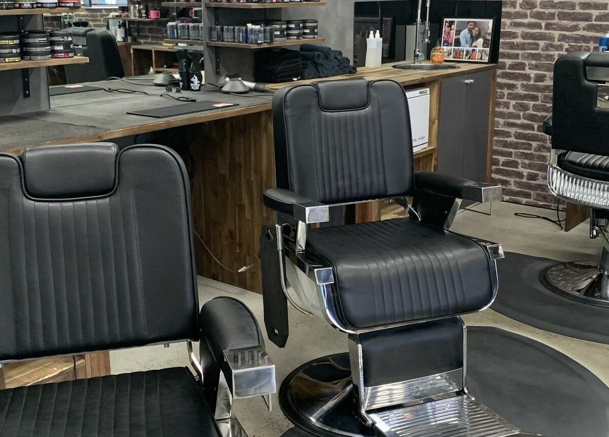 Barber chairs at Lole's Barber Shop - Commercial Drive in Springfield, Queensland, AU showcasing modern style.