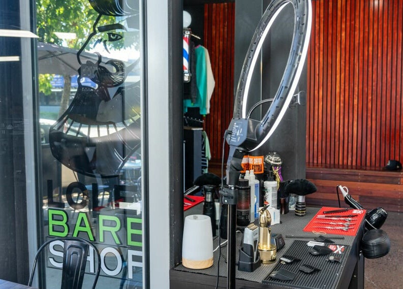 Interior view of Lole's Barber Shop - Commercial Drive, Springfield, Queensland, AU showcasing professional styling tools.