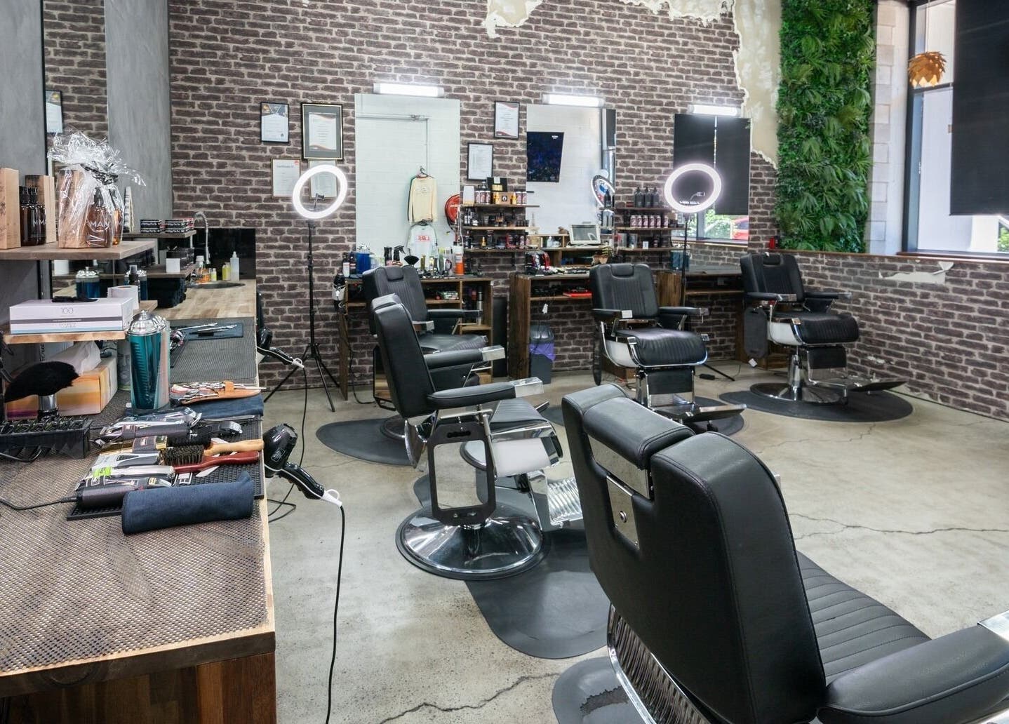 Modern barber chairs at Lole's Barber Shop - Ian Keilar Drive, Springfield Central, QLD, AU.
