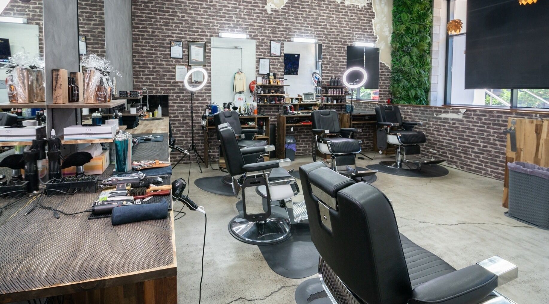 Modern barber chairs at Lole's Barber Shop - Ian Keilar Drive, Springfield Central, QLD, AU.