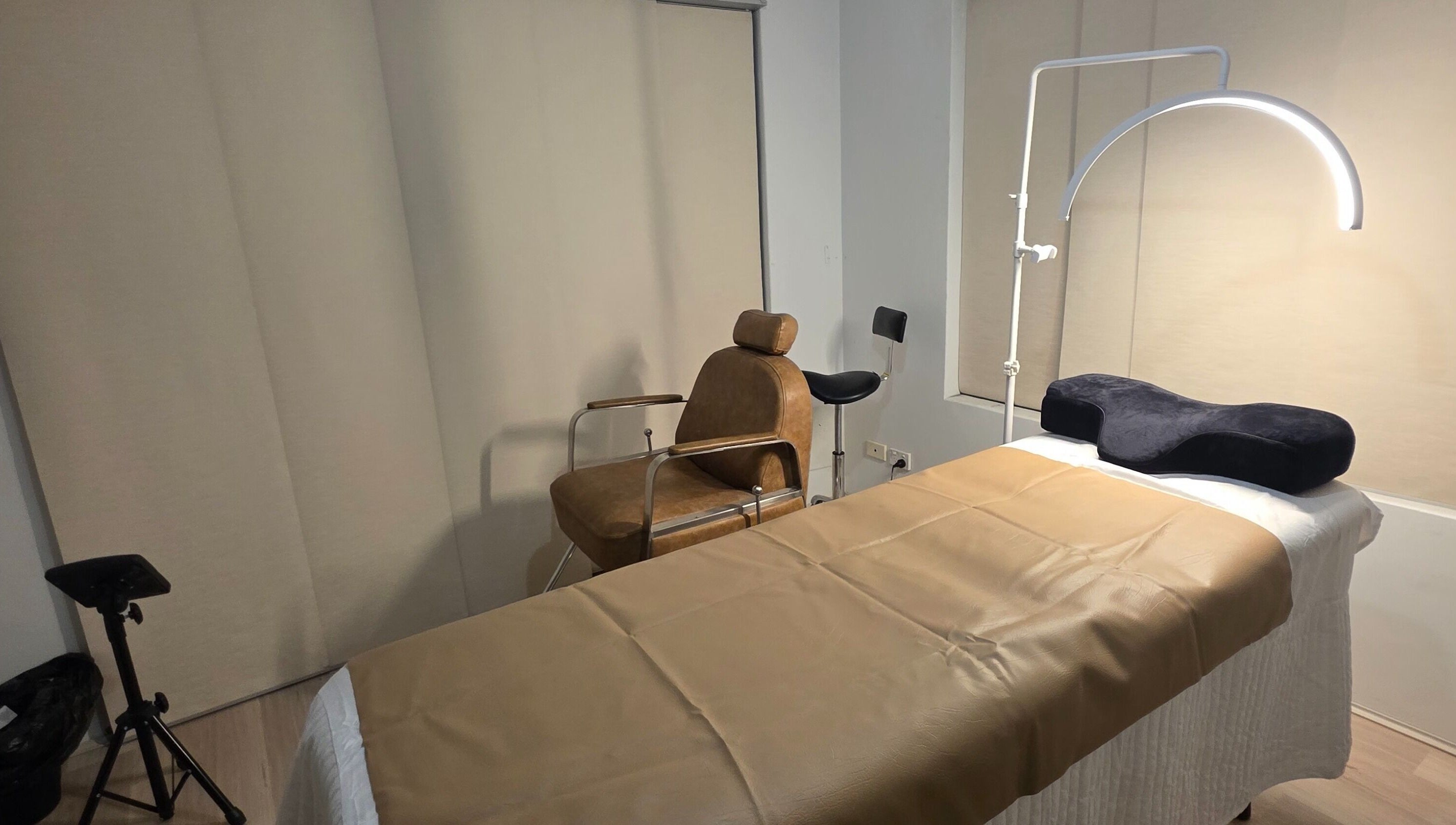 Serene treatment room at Doin Just Fine - Fine Line Tattoo in Bentley, Western Australia, AU.